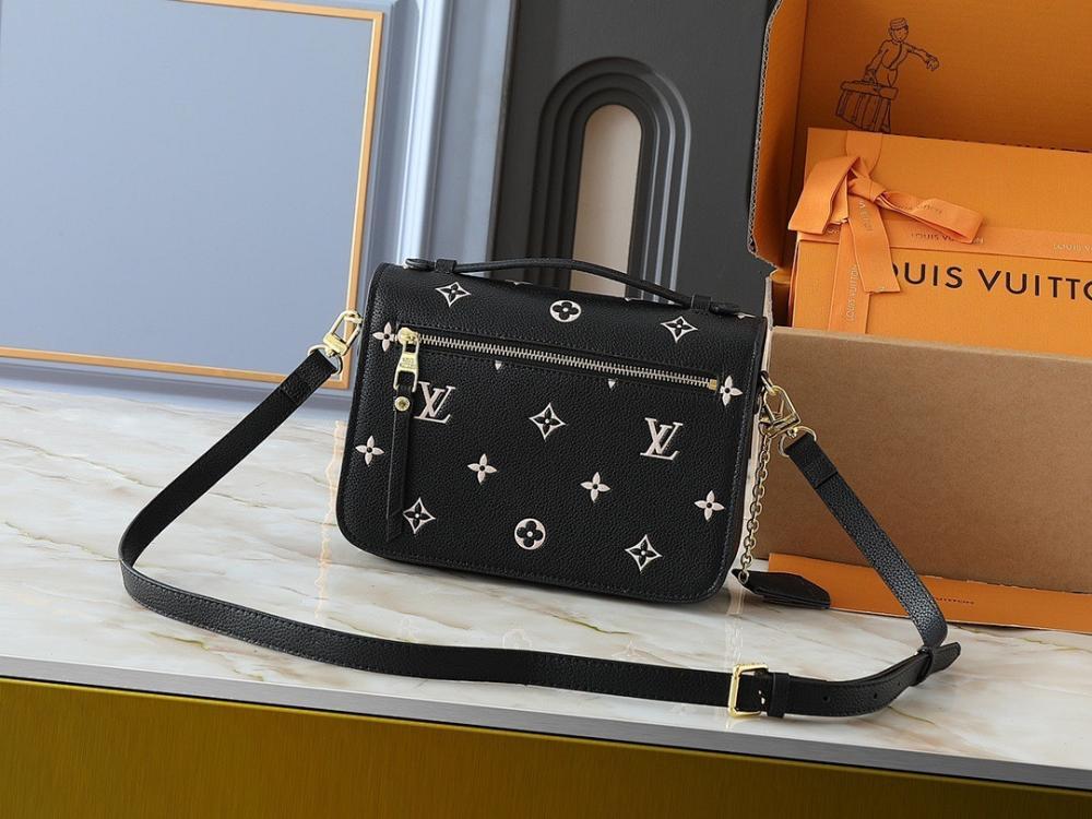 The Pouch Monogram Leather Top Handle Bag