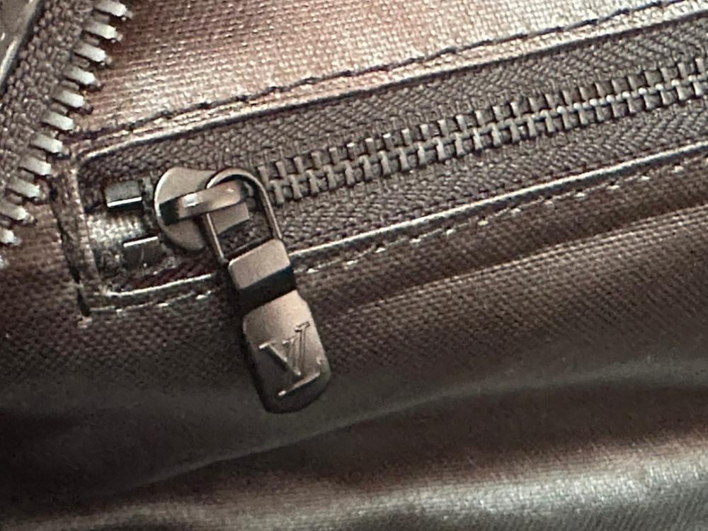 Elegant Monogram Leather Travel Bag – Limited Edition
