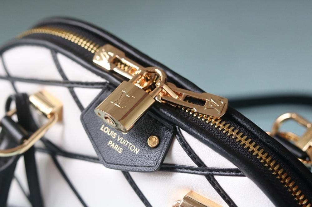 Alma Quilted Lambskin Travel Bag