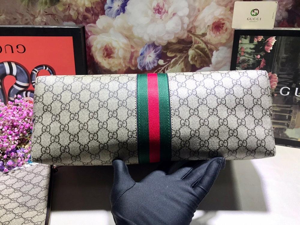 Ophidia Top Handle Bag