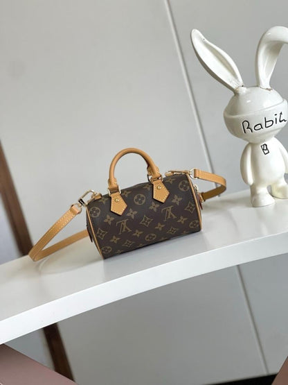 Speedy Monogram Leather Top Handle Bag