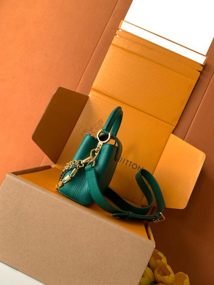 Capucines Gold Top Handle Bag