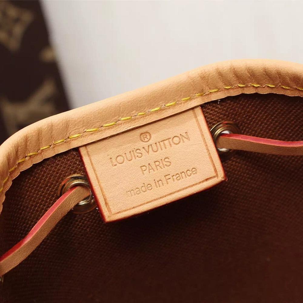 Kate Monogram Top Handle Bag