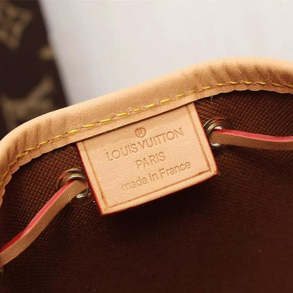 Kate Monogram Top Handle Bag