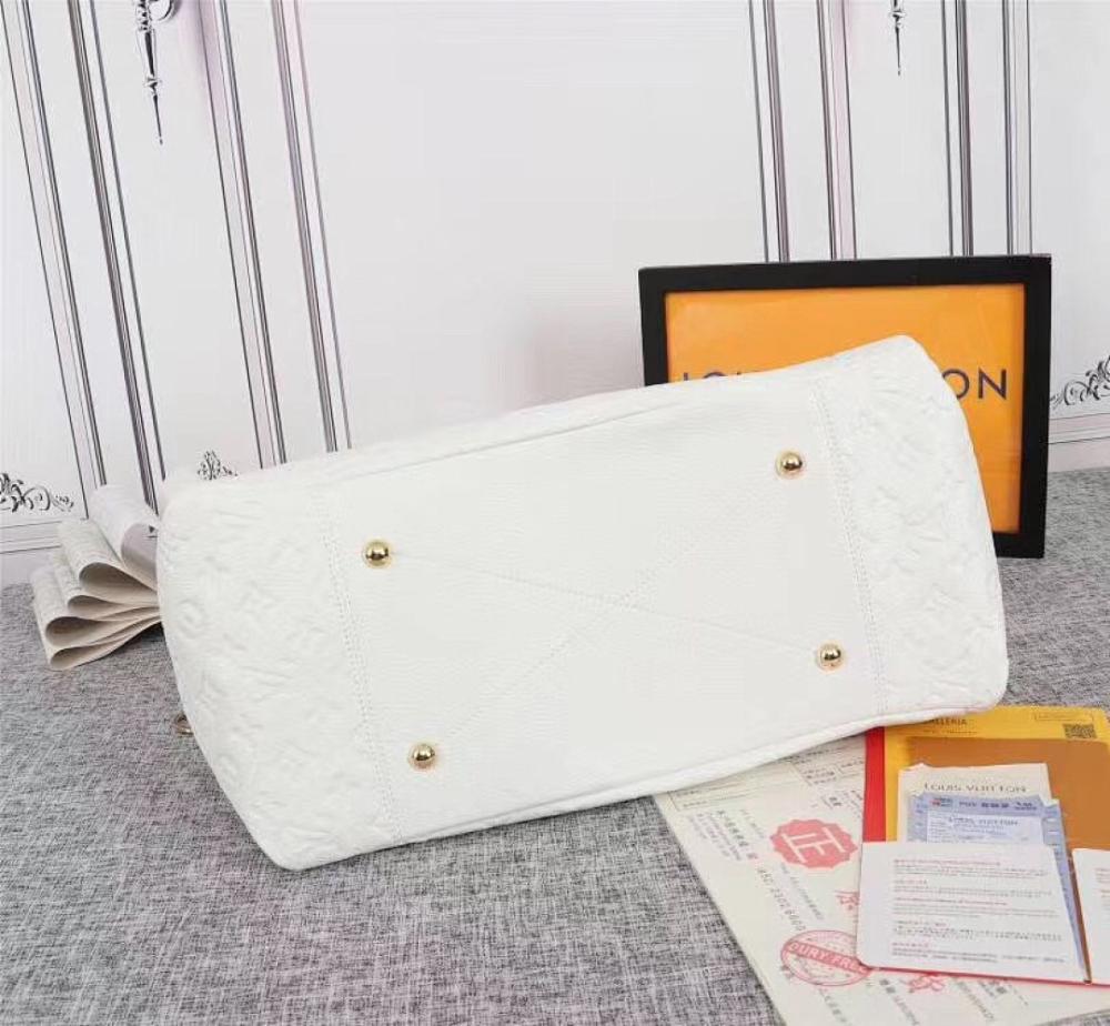Modern Italian-Inspired Gold Monogram Top Handle Bag