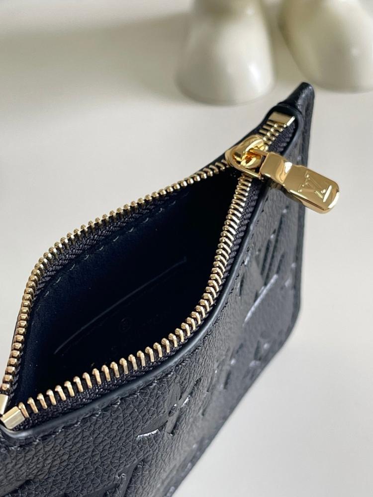 Modern Refined Monogram Leather Bucket Bag