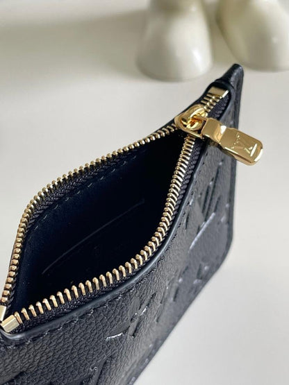 Modern Refined Monogram Leather Bucket Bag