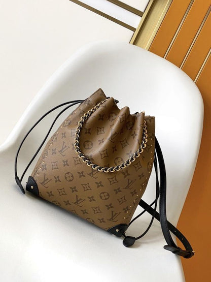 Woven Leather Top Handle Bag