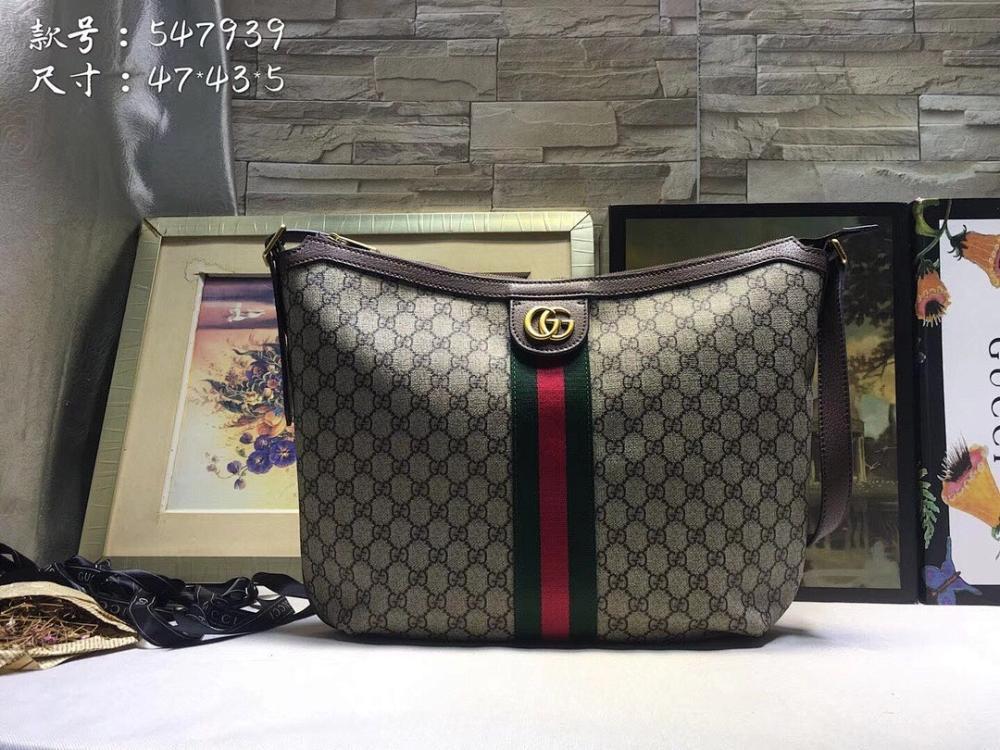 Ophidia Top Handle Bag