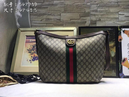 Ophidia Top Handle Bag