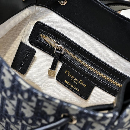 Elegant Gold Embroidered Lambskin Bucket Bag – Special Edition