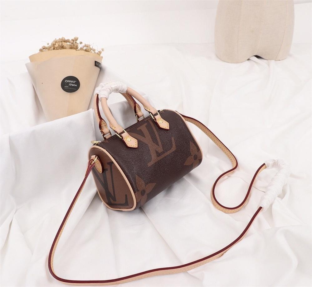 Speedy Monogram Top Handle Bag