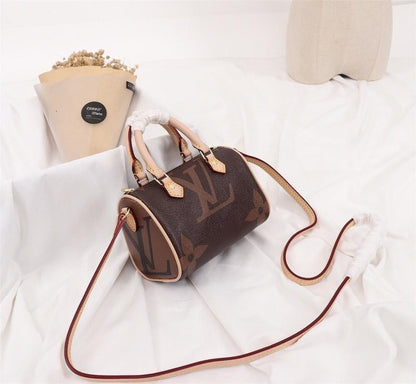 Speedy Monogram Top Handle Bag
