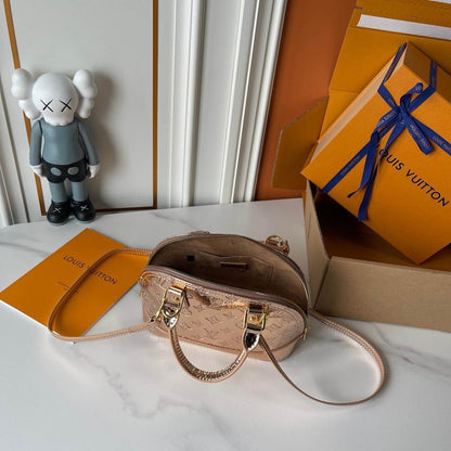 Alma Monogram Travel Bag