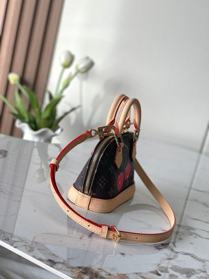 Alma Monogram Leather Shoulder Bag