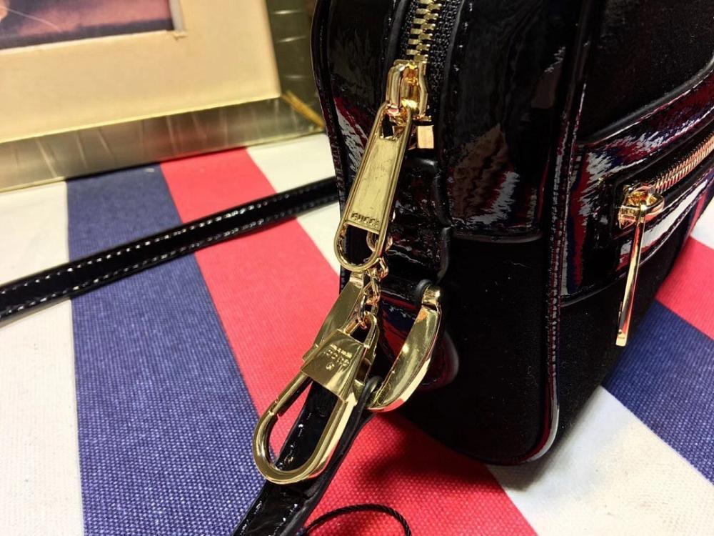 Ophidia Top Handle Bag