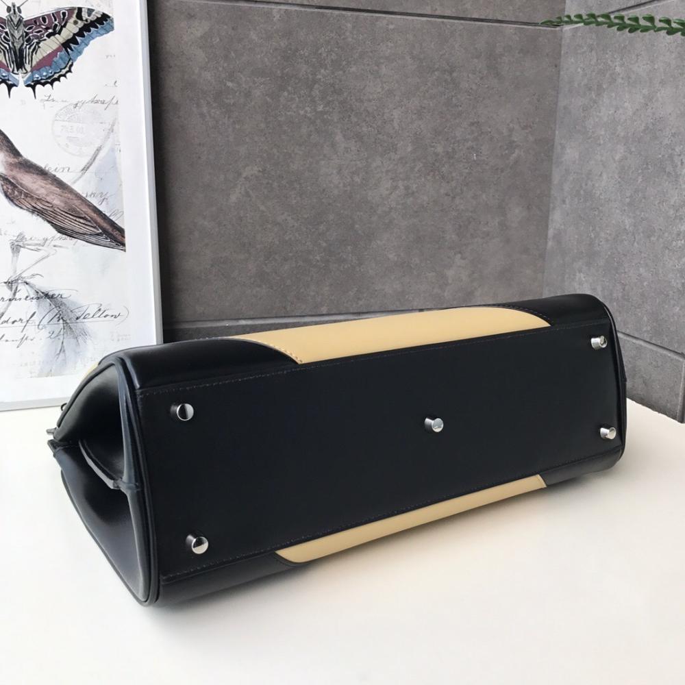 Practical Luxury Top Handle Bag