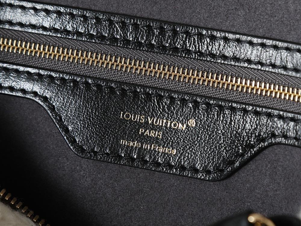 Elegant Refined Monogram Lambskin Top Handle Bag