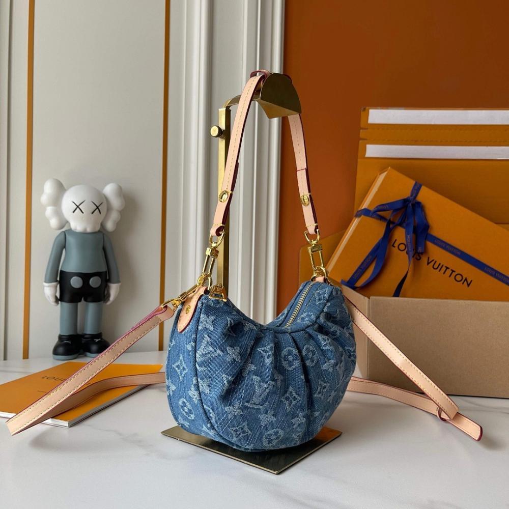 The Pouch Monogram Leather Top Handle Bag