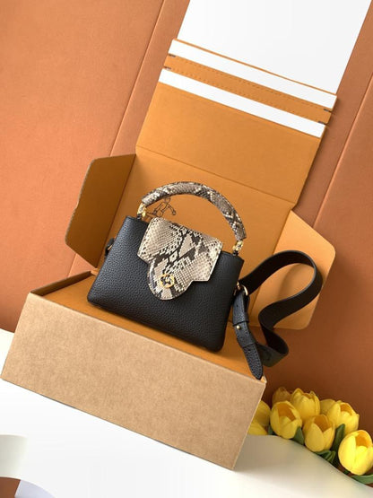 Capucines Mini in Black Taurillon Leather with Python Trim