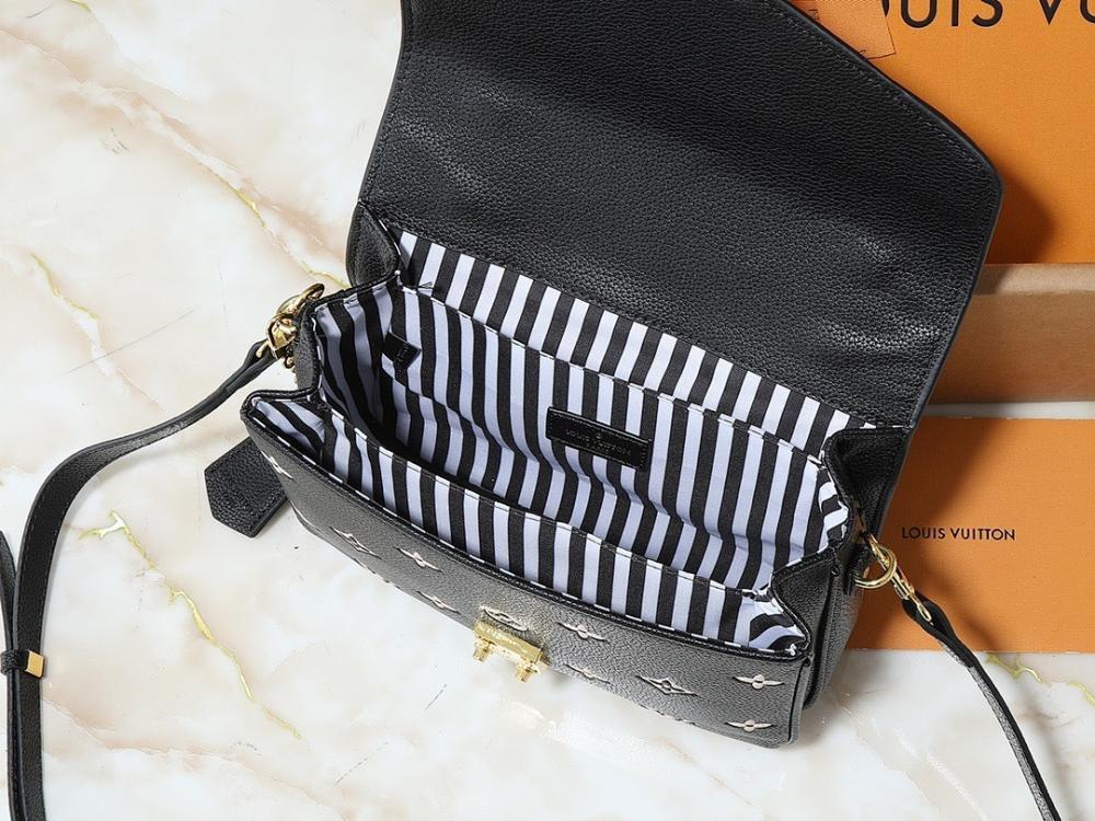 The Pouch Monogram Leather Top Handle Bag