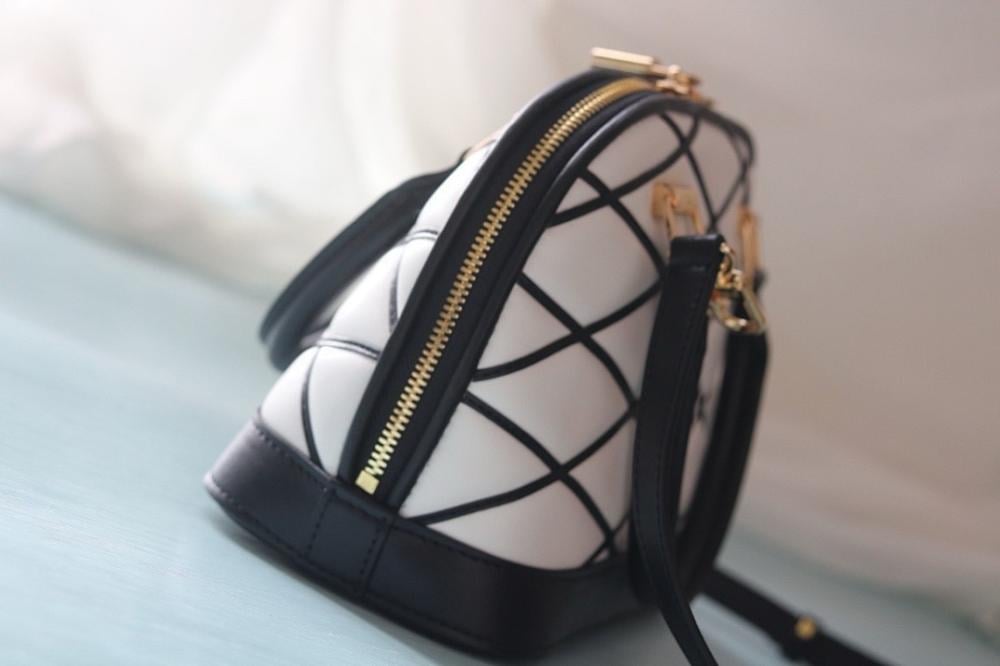 Alma Quilted Lambskin Travel Bag