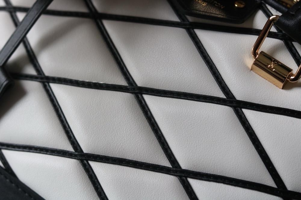 Alma Quilted Lambskin Travel Bag