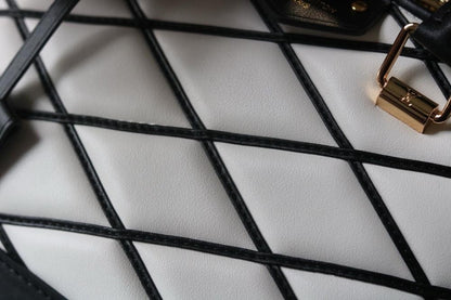 Alma Quilted Lambskin Travel Bag