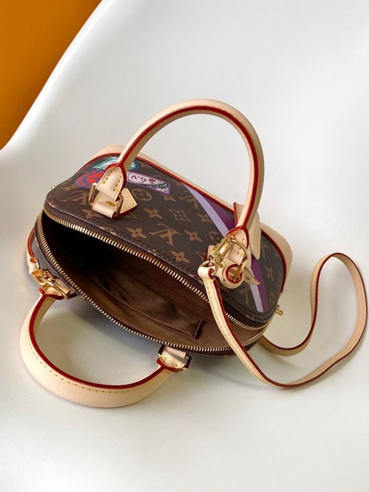 Alma Monogram Travel Bag