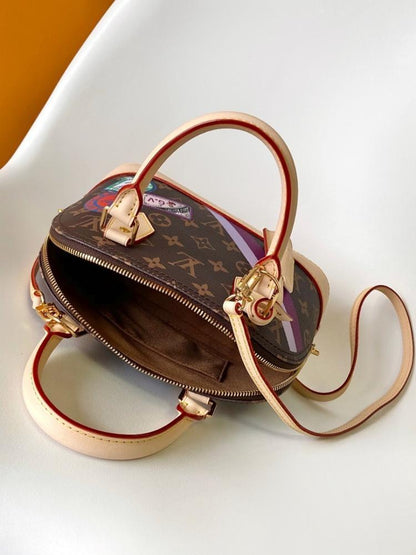 Alma Monogram Travel Bag
