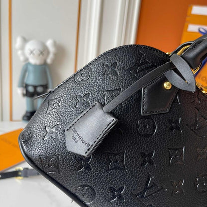 Alma Gold Monogram Leather Bucket Bag