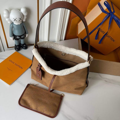Elegant Monogram Leather Crossbody Bag – Limited Edition