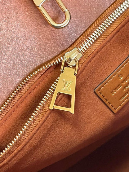 OnTheGo Monogram Leather Top Handle Bag