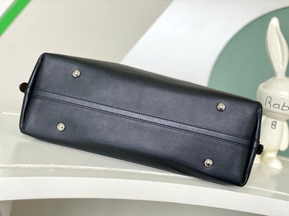 Elegant Refined Lambskin Top Handle Bag