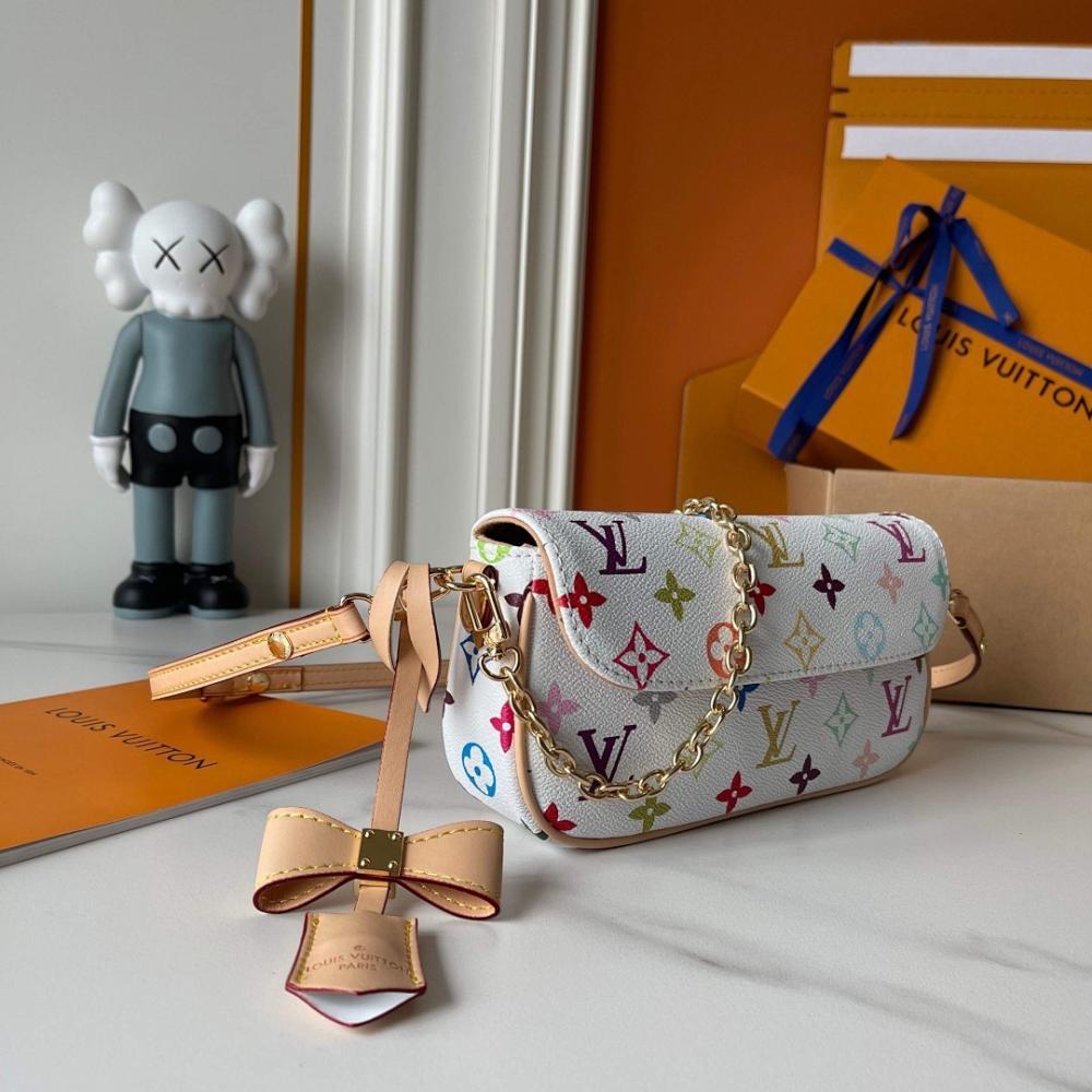 Speedy Monogram Leather Top Handle Bag