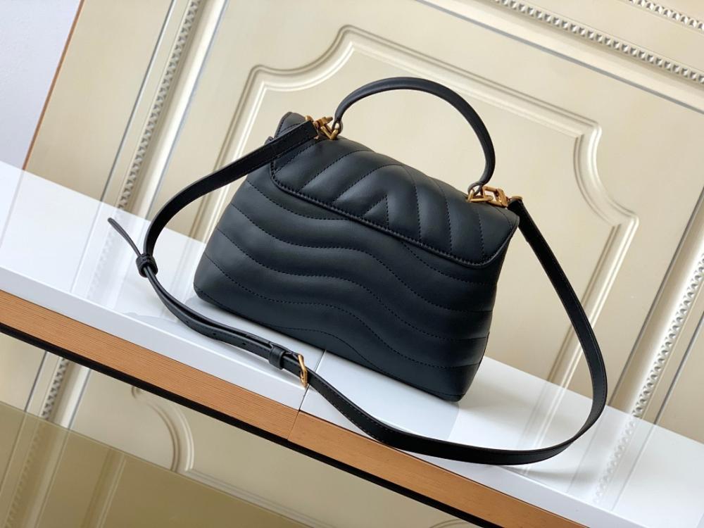 Modern Quilted Leather Top Handle Bag