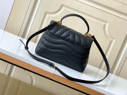 Modern Quilted Leather Top Handle Bag
