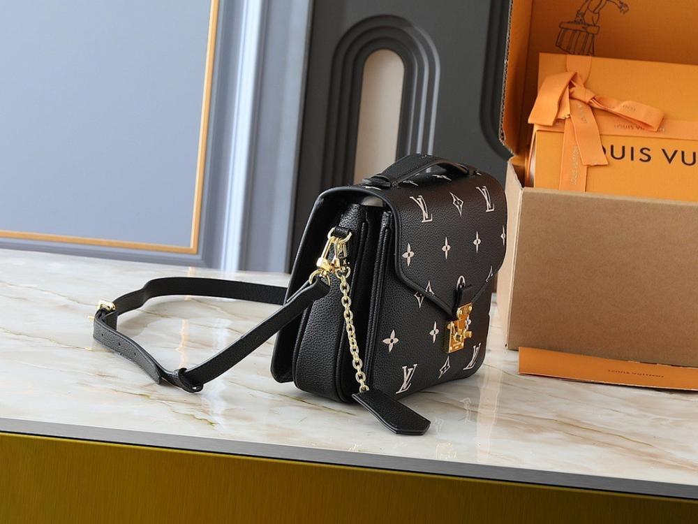 The Pouch Monogram Leather Top Handle Bag