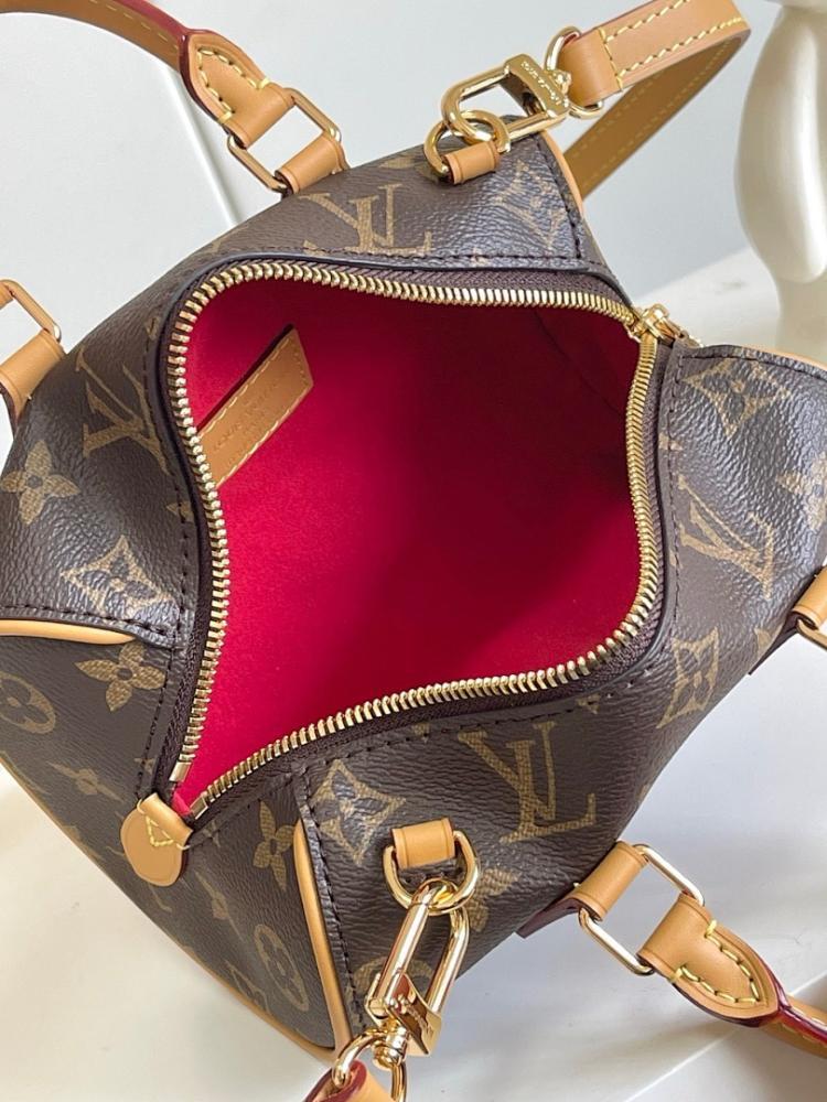 Speedy Monogram Leather Top Handle Bag