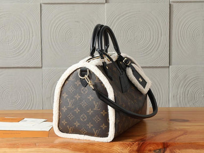 Elegant Refined Monogram Lambskin Top Handle Bag