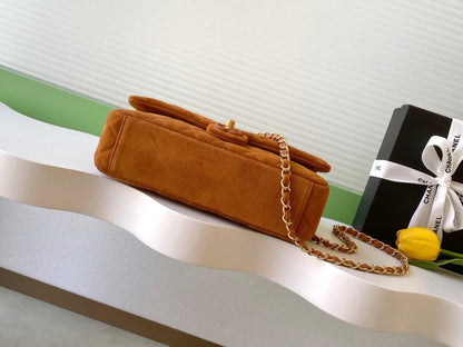 Alma Gold Suede Top Handle Bag