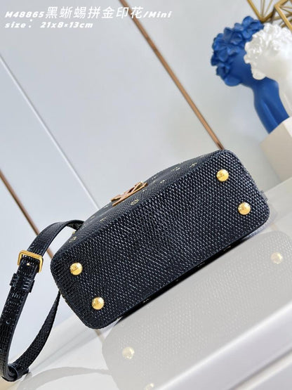 Capucines Leather Top Handle Bag