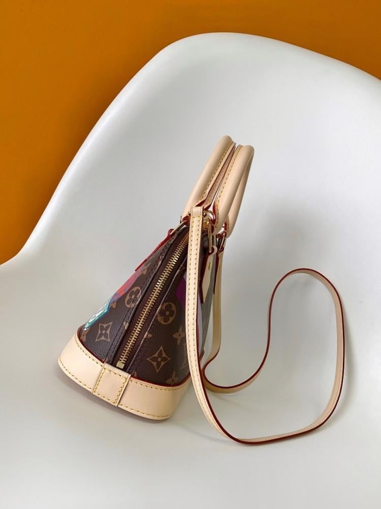 Alma Monogram Travel Bag