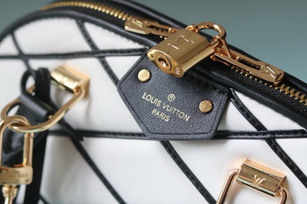 Alma Quilted Lambskin Travel Bag
