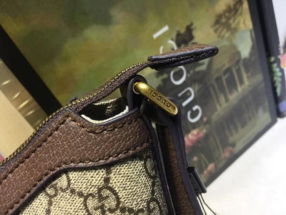 Ophidia Top Handle Bag