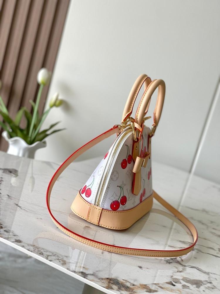 Alma Monogram Leather Top Handle Bag