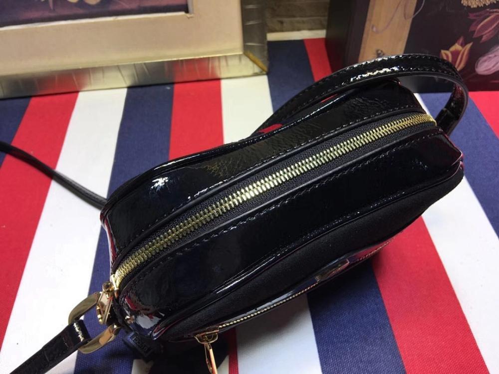 Ophidia Top Handle Bag