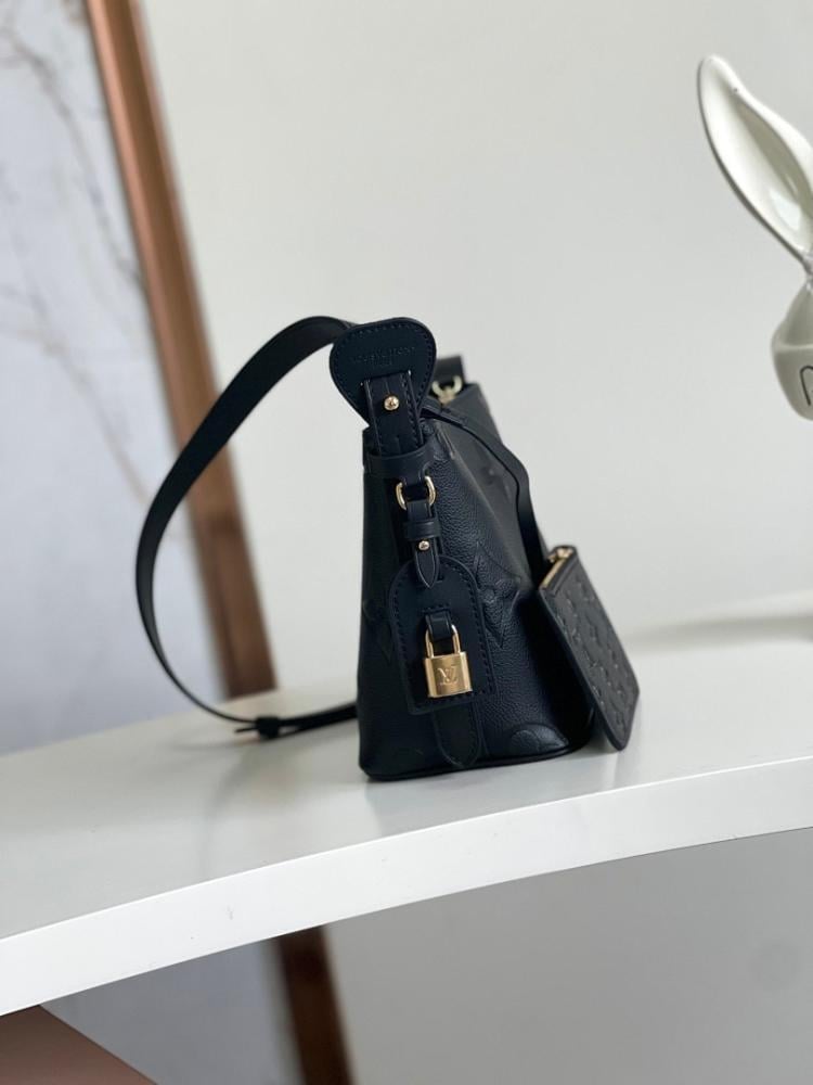 Modern Refined Monogram Leather Bucket Bag
