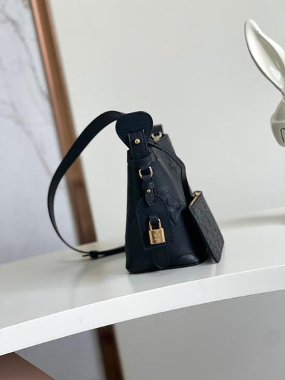 Modern Refined Monogram Leather Bucket Bag