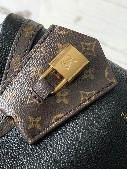 Modern Elegant Monogram Calfskin Top Handle Bag